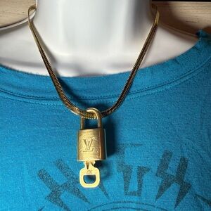 Louis Vuitton Lock and Key #307 on a Jennifer Zeuner Hamilton Necklace.